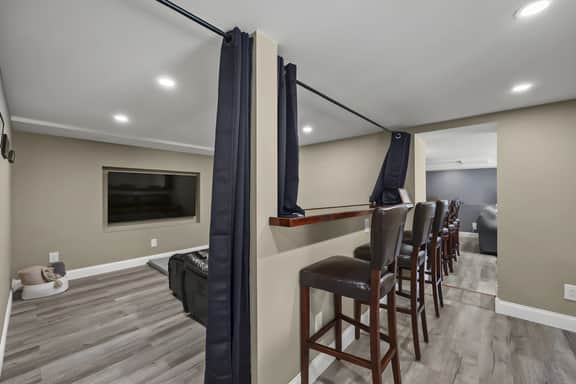 The Reel Retreat | Theatre & Firepit • Game Room