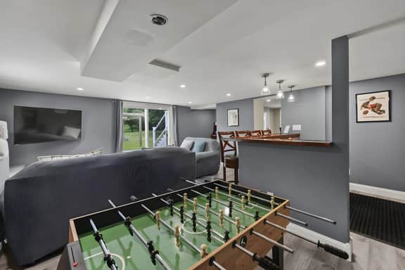 The Reel Retreat | Theatre & Firepit • Game Room